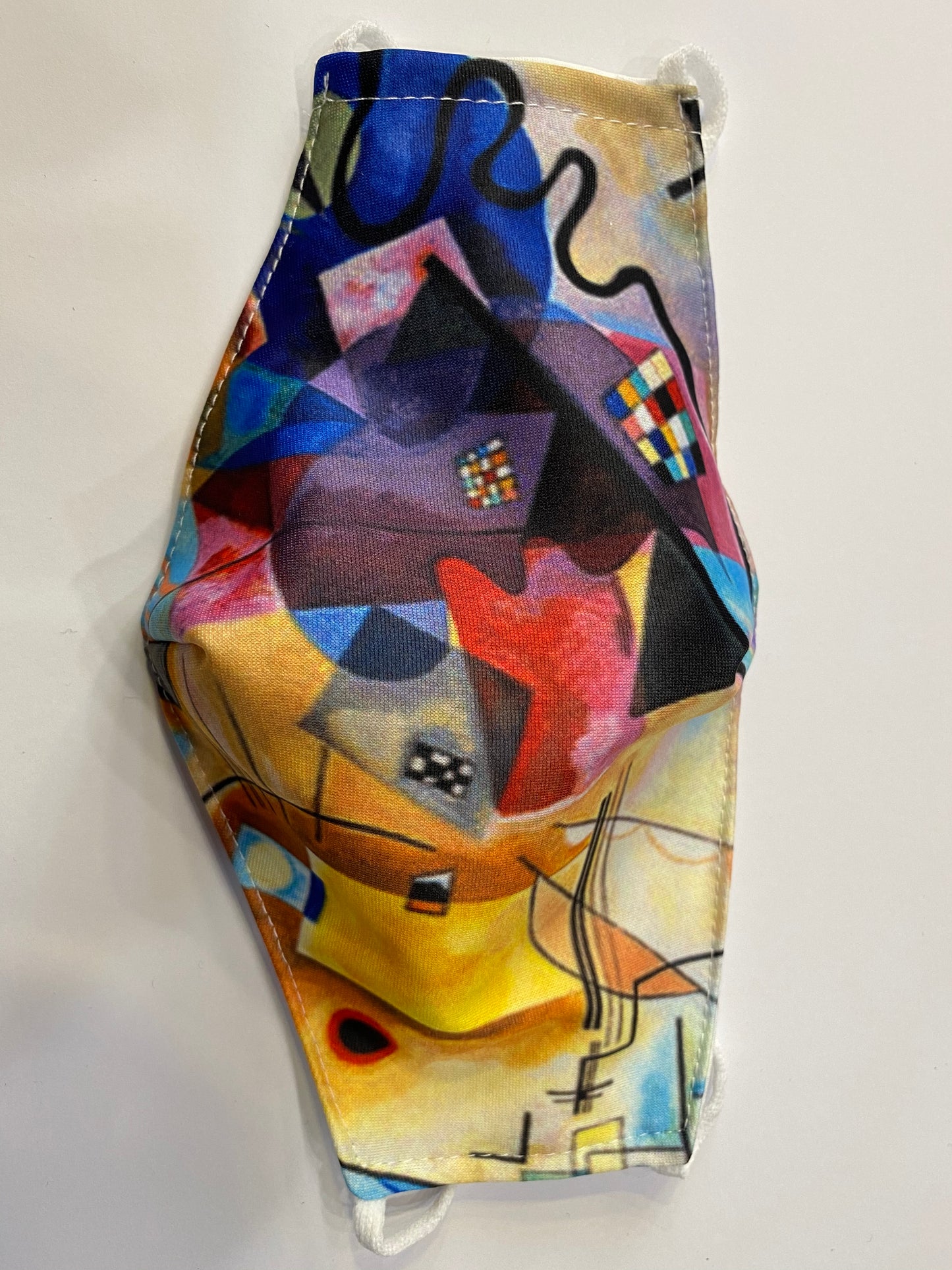 Mascherina protettiva multicolor astratto